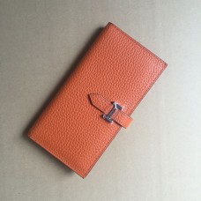 Cartera Hermes de piel de becerro H005 en naranja